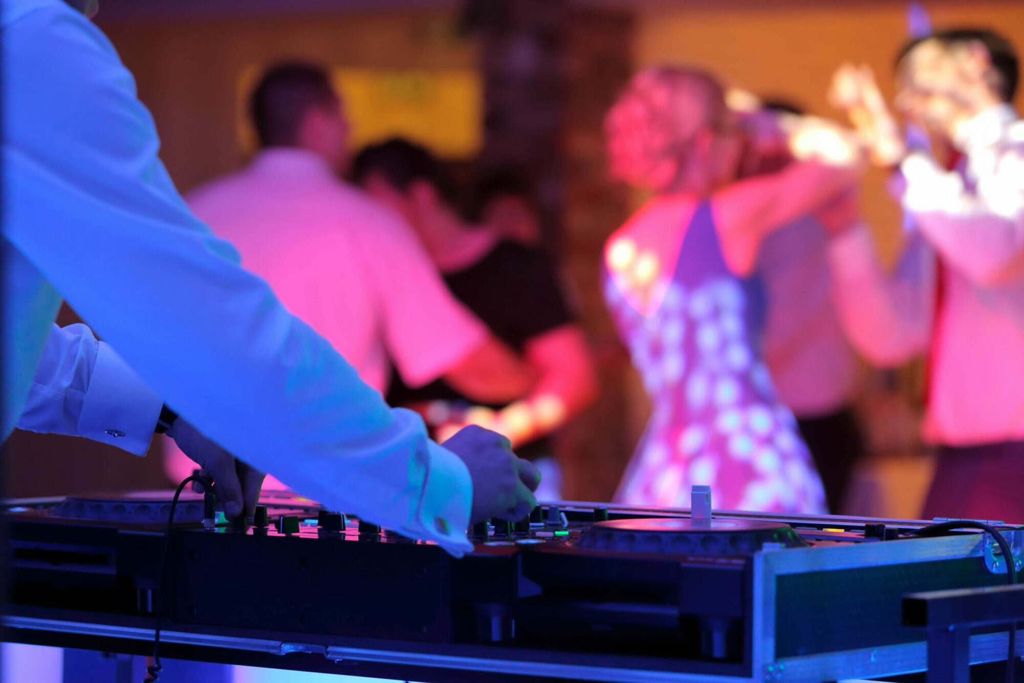 The Role of a Wedding DJ: Crafting the Ultimate Party Atmosphere